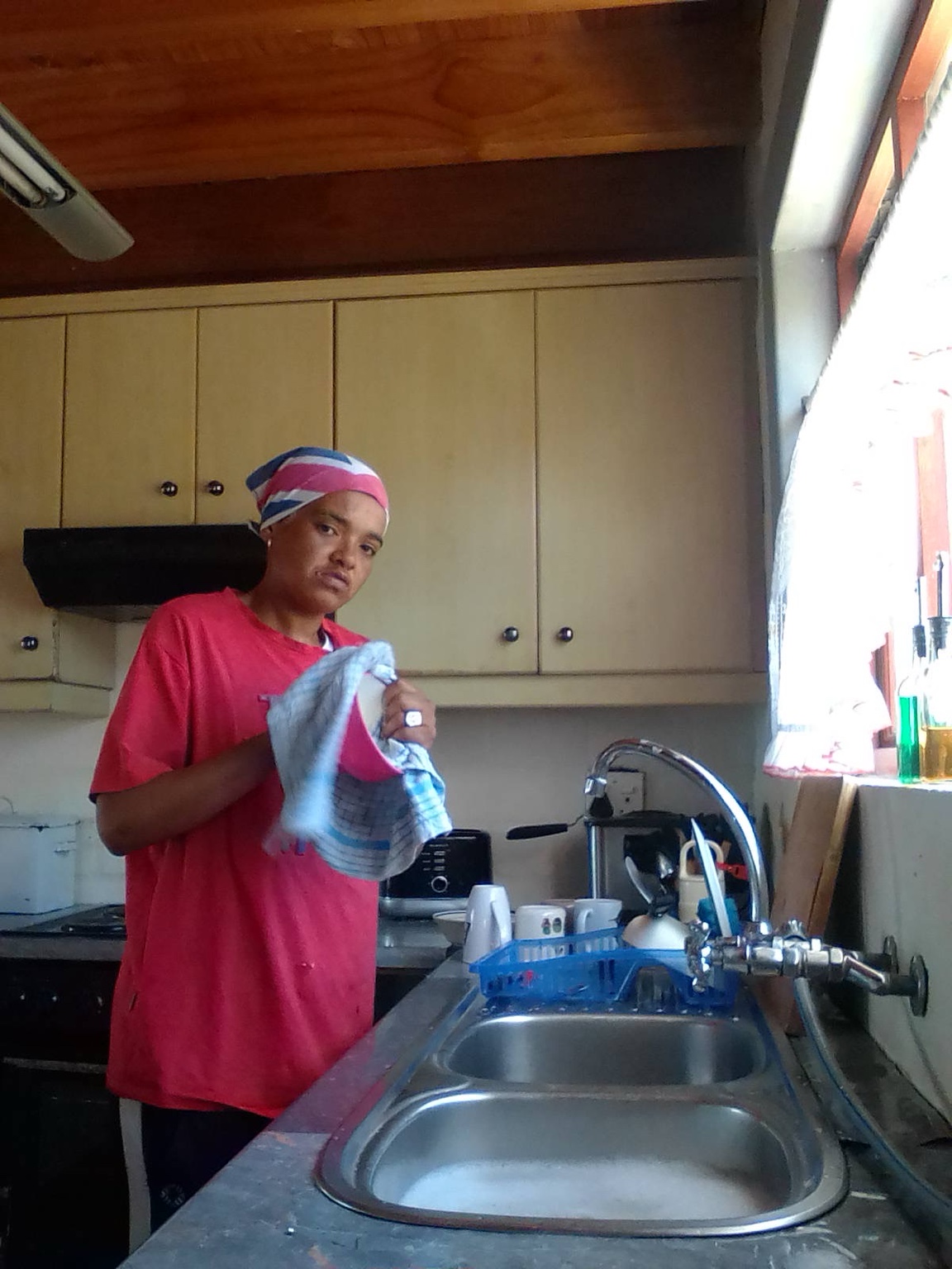 Drying and detailing dishes at a double sink